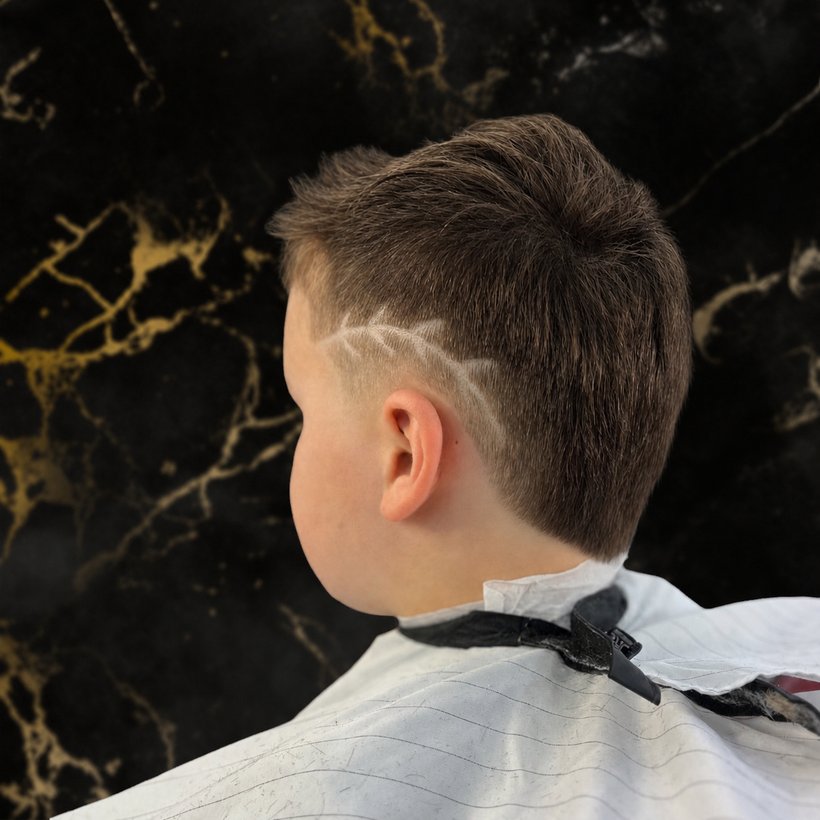 Kids cut with a hair design by SH Barbershop